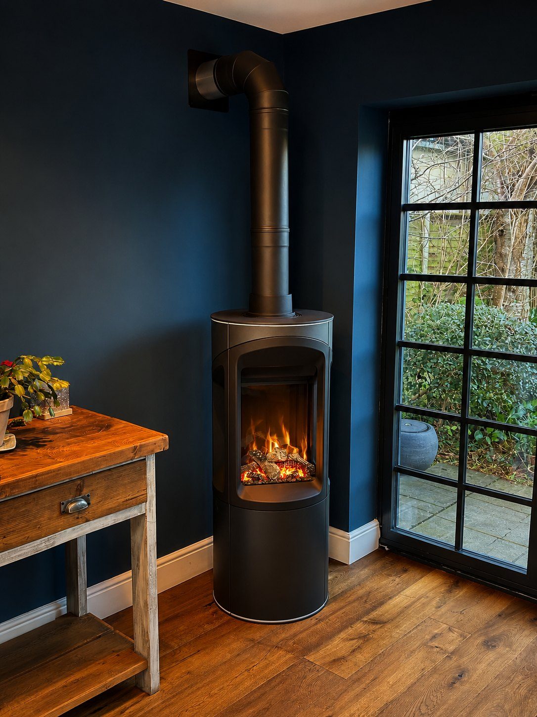A warm corner of a room lit by an open fire